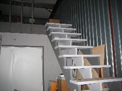 Stairs are done.  No more climbing to the top on a ladder!