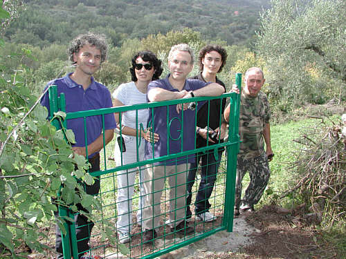 Vezio poured a little wine on the gate to christen it